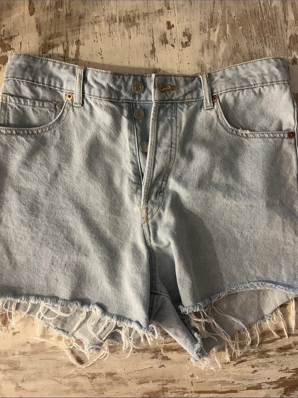 H&M light denim high rise shorts. Size 8